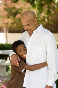 Grandson hugging his grandfather